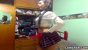 Big tits & ass Latin schoolgirl striptease out of her uniform